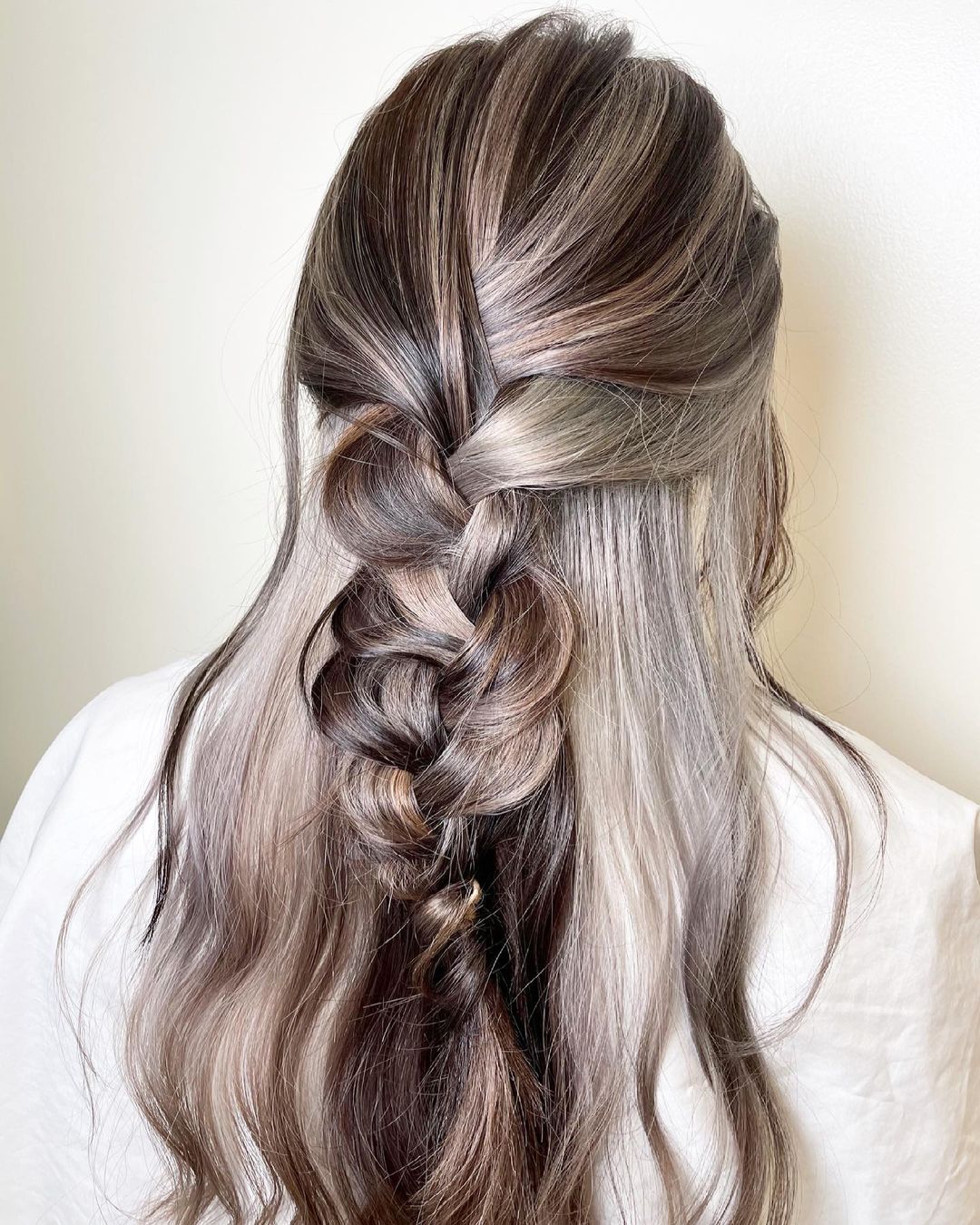 Blonde peekaboo highlights under brown hair